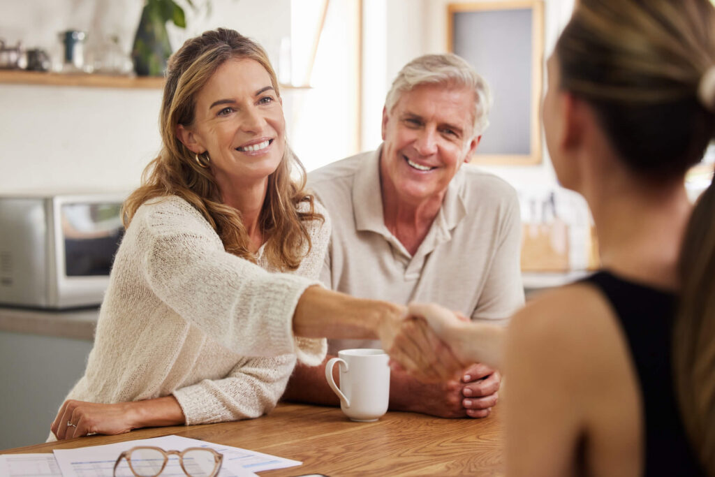 older couple meeting with professional