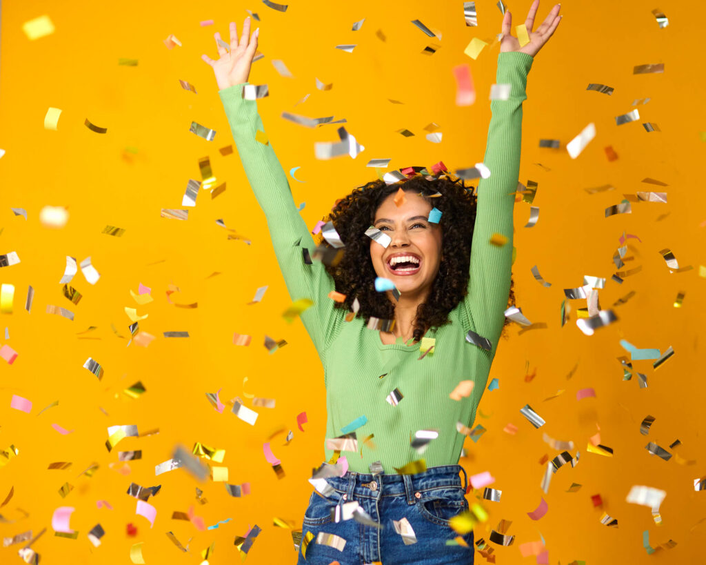 woman celebrating because she won the lottery